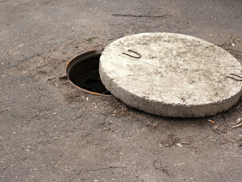 round concrete manhole cover